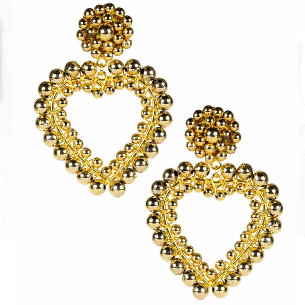 Gold heart earrings by Lisi Lerch